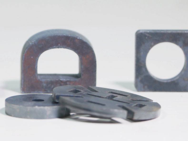 Metal parts cut as samples with Dowell Laser equipment